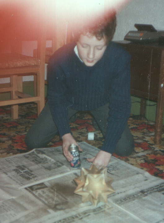 The author, as a boy, spray-painting a compound of 10 tetrahedra.